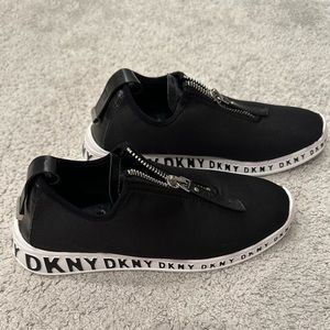 DKNY black sneaker zipper detail